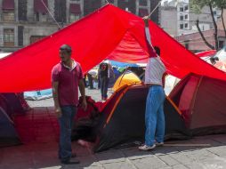 La CNTE acusa que el desalojo del plantón se realizó por medio intimidación y amenazas. SUN / A. Martínez