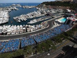 Con los movimientos, Carlos Sainz (Toro Rosso) saldrá sexto y Fernando Alonso (McLaren-Honda), noveno. AFP / V. Hache