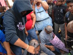 ''Dijeron que nos iban a linchar y alguien gritó ‘¡quémenlos, quémenlos!'', cuenta Armando Castellanos Aguilar sobre la agresión. EFE / ARCHIVO