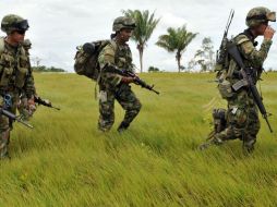 El gobierno colombiano y las FARC llevan a cabo desde hace más de tres años unos diálogos que esperan concluir próximamente. AFP / ARCHIVO