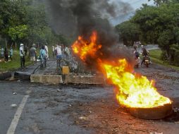 Los campesinos salieron a las calles desde el pasado lunes generando refriegas con la fuerza pública. AFP / L. Robayo