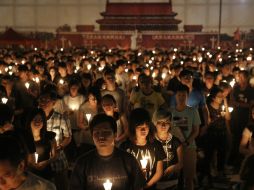 Centenares, quizá miles de personas, murieron cuando tanques y soldados convergieron en Beijing la noche del 3 al 4 de junio de 1989. AP / K. Cheung