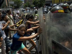 Las protestas crecieron cuando el gobierno venezolano  estableció un nuevo mecanismo de distribución de alimentos. EFE / M. Gutiérrez