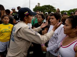 Decenas de guardias nacionales tomaron las calles para tratar de restablecer el orden. AP / F. Llano