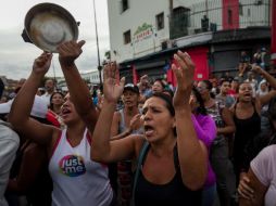 La manifestación se extendió hacia un centro comercial, donde más de 60 comercios fueron saqueados. EFE / M. Gutiérrez