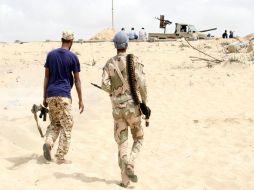 Fuerzas de la citada Alianza lograron el pasado 11 de junio romper la resistencia y conquistar el puerto. AFP / STRINGER