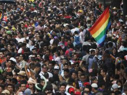 Los protestantes utilizaron vestuarios provocativos, coloridos y banderas multicolor. AP / M. Ugarte