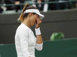 Muguruza, que este día pierde, fue sorpresa en Roland Garros, tras coronarse campeona ante Serena Williams. AP / B. Curtis