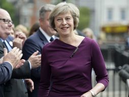 ''Este voto demuestra que el Partido Conservador puede estar unido. Bajo mi liderazgo lo estará'', dice May. EFE / H. Mckay