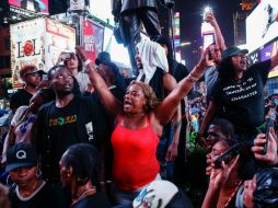 '¿Quién será el próximo?', 'Cuidado con el racismo', 'No disparen', decían algunas de las pancartas. AFP / K. Betancur