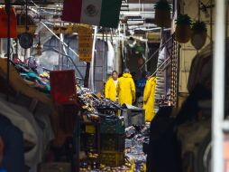 En su visita al mercado, Alfaro informó a los locatarios sobre las obras de remodelación de la zona siniestrada. EL INFORMADOR / ARCHIVO
