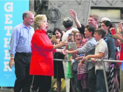 Las infiltraciones al Comité Nacional Demócrata no los detienen, Hillary Clinton y Tim Kaine continúan con su campaña presidencial. AFP /