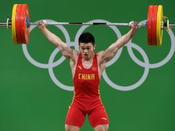 Shi, actual campeón del mundo, levantó 162 kg en arranque y 190 kg en envión. AFP / G. Hin