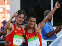 El ganador, Wang Zen, termina la carrera con un tiempo de 1:19:14. EFE / H. H. Young