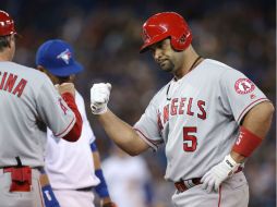 Albert pujols. El dominicano consiguió esta nueva marca después de igualar el décimo puesto de todos los tiempos en jonrones. AFP / T. Szczerbowski