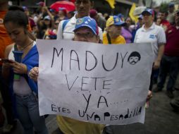 Opositores afirman que la gente a lo que tiene miedo es a que continúe el mandato de Maduro. AP / ARCHIVO