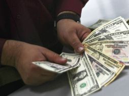 Banco Base explica que el peso mexicano registra una depreciación luego de que supiera el estado de salud de Clinton. EL INFORMADOR / ARCHIVO