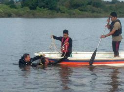 Protección Civil procedió a sacar los cuerpos de la presa. TWITTER / @PCJalisco