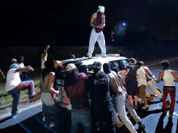 La muerte de Scott provocó graves disturbios en la ciudad, que se prolongaron hasta la madrugada; confirman 16 heridos. AP / J. Siner