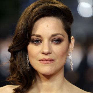 Marion Cotillard niega romance con Brad Pitt