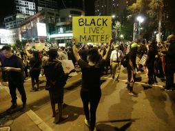 Los disturbios han dejado atrás un muerto, numerosos heridos y medio centenar de detenidos. AP / G. Broome