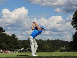 Dustin Johnson firmó ayer una tarjeta de 67 golpes y acumula 133, siete bajo par. AFP /  S. Greenwood