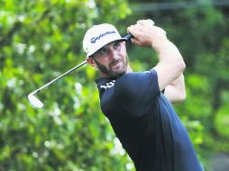Dustin Johnson firmó ayer una tarjeta de 69 golpes para compartir la cima con su compatriota Kevin Chappell. AFP / S. Greenwood