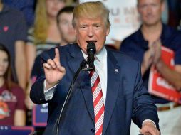 Amenazó con invitar a una mujer que tuvo una aventura con el Bill Clinton para que ocupe un asiento en prima fila en el debate. AFP / S. Davis