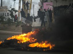 Incendios y barricadas en Oaxaca durante los enfrentamientos del pasado 19 de junio de 2016. EFE / ARCHIVO