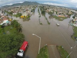Señalan que hasta que bajen los niveles de agua se inciarán los trabajos de limpieza en las zonas afectadas. ESPECIAL / Gobierno de Tlajomulco
