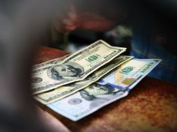 La compra mínima del dólar fue de 18.54 pesos en la Ciudad de México. EL INFORMADOR / ARCHIVO