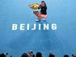 Radwanska dominó totalmente el segundo set y ganó con un saque as. AP / N. Han Guan