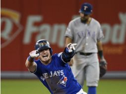 Josh Donaldson reacciona tras meter un doblete a Los Rangers de Texas. AP / N. Denette
