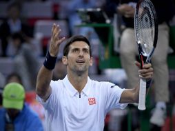 Djokovic, que busca una nueva corona en China, jugará en la siguiente fase con Mischa Zverev. AFP / W. Zhao