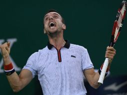 Roberto Bautista celebra tras saberse clasificado a la final. AFP / W. Zhao