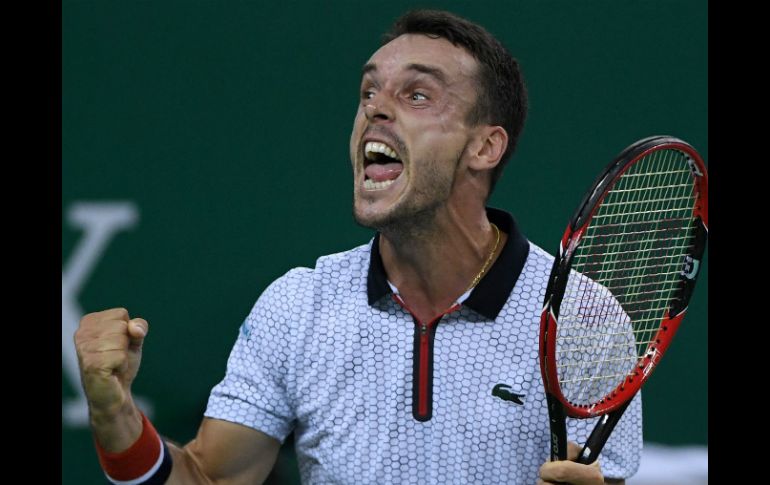 Bautista asegura que está contento de haber triunfado en el que quizá es ''el partido más importante'' de su carrera. EFE / W. Zhao