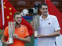 Isner y Sock, que habían jugado juntos sólo en dos torneos anteriormente, sólo tuvieron que romper un juego en cada set. AP / A. Wong