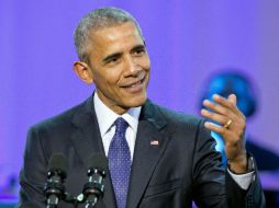Antes de ser presidente ''viajaba en clase turista y se muy bien todo el dolor de cabeza que enfrentan los usuarios'', dice Obama. EFE / R. Sachs