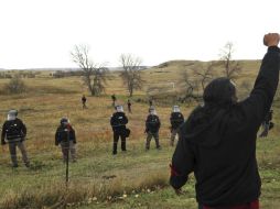 Más de 20 manifestantes fueron arrestados, de acuerdo con Fong. AP / J. MacPherson