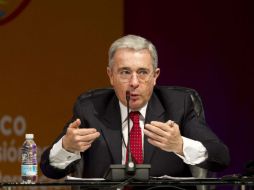 A la reunión también acudió el jefe de la oposición, el expresidente colombiano Álvaro Uribe. AFP / ARCHIVO