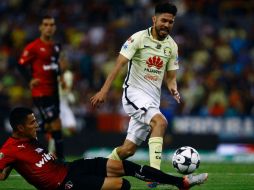 América se envalentonó y logró quedarse con el empate que lo mantiene con esperanzas de calificar a la Liguilla. AFP / H. Guerrero