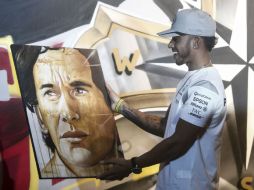 'Tenía la rara cualidad de la grandeza', escribe Hamilton acerca de Senna. AFP / M. Schincariol