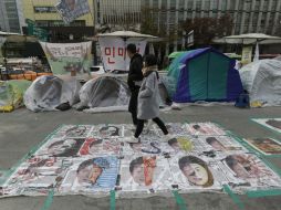 El escándalo ha reducido a mínimos la popularidad de Park y ha generado peticiones masivas de dimisión. AP / A. Young-joon