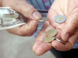 El peso se cotizó ayer en 20.21 unidades por dólar. EL INFORMADOR / ARCHIVO