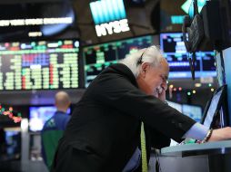 El Dow Jones, el principal índice de Wall Street, cedió 0.60% hasta 19 mil 792.66 unidades. AFP / S. Platt