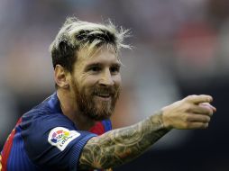 Rafinha espera que el astro argentino acabe ampliando su contrato con el conjunto catalán. AP / ARCHIVO