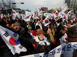 Un grupo de manifestantes marcharon hacia las instalaciones de la Corte Constitucional. EFE / Y, Woong