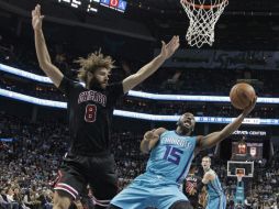 Kemba Walker (#15) logró 20 puntos en el partido. AP / C. Burton