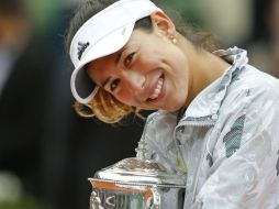 Muguruza reconoce la carga psicológica que implicó ganar uno de los cuatro Grand Slams de la temporada. AP / ARCHIVO