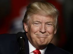 Los pequeños colocaron pequeños corazones a uno más grande, con la leyenda 'Trump', al que rodean de esperanza, armonía y paz. AP / M. Rourke